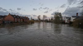 The River Severn has burst its banks in Shrewsbury, Shropshire, swamping homes and businesses in its wake