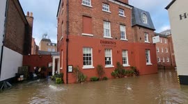 4K footage: Storm flooded businesses have been attempting to save their properties from flooding in Shrewsbury, Shropshire