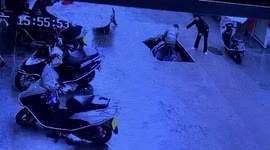Scooter rider falls into sinkhole that opens up on road in China