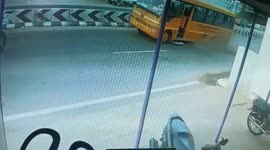 Shocking moment rear wheels of speeding school bus break away in southern India