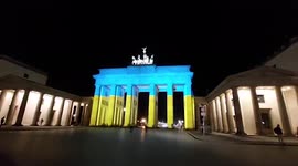 Germany: Brandenburg Gate In Berlin Illuminated In Ukrainian Flag Colors 2