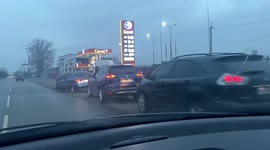 Dozens of motorists queue outside Kyiv petrol station in response to Russia attack