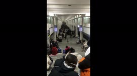 Ukrainians take shelter at underground metro station in Kharkiv