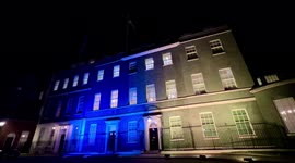 10 Downing Street lit up in colours and Ukrainian Flag flies as Russia invades Ukraine