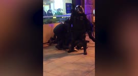 Russian riot police attack anti-war protesters in Moscow following Ukraine invasion