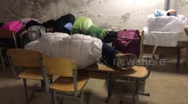 Ukrainians take shelter in makeshift underground bunker as Russian troops reportedly close in on capital