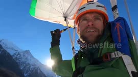 Incredible footage shows thrill-seeker friends ski-base jumping on dangerous glacier
