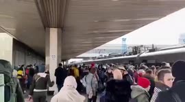 Kyiv residents flock to train station in attempt to flee capital and head towards Poland