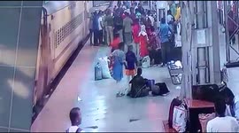 Indian security personnel saves passenger's life after he slips while boarding a train