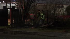 Houston Firefighters put out trash fire behind an abandon Donut Shop