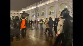 Russian woman arrested by police during anti-war rally in St Petersburg