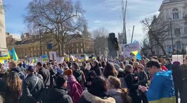 Protesters chant “Putin is a killer” during a huge demonstration in Whitehall, London