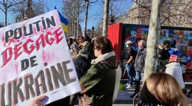 War Russia vs Ukraine. Demo in support with Ukraine. Paris, Place de la République, France. 26feb2022.15h. (+lighting of the Eiffel Tower in the colors of Ukraine). All images from the 26 feb 2022.