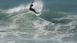 Spring brings specatular sunshine and surf to memorial surfing contest in Newquay, Cornwall, UK