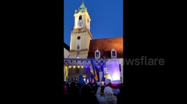 Bratislava, Slovakia: People sign Ukrainian national anthem to protest war