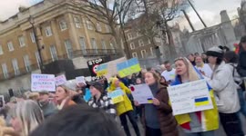 Russia invade Ukraine, Demonstrators sing in solidarity for the people of Ukraine . Flags, banners and emotions , stop Putin , stop the war