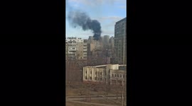 Smoke rises from tower block in Bucha, outside Kyiv, amid Russian assault on Ukrainian capital