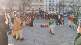 Impovised skateboard contest in the streets of Paris. Face to the Cirque d'Hiver circus. 27feb2022.
