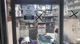 Government guideline effect, traders pasted information about COVID-19 vaccination outside shops and offices in Rajasthan