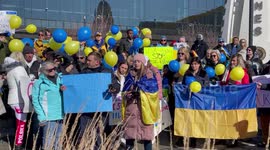 Pro Ukraine Rally in Green Bay Wisconsin - Woman Sings Nations Song at Veterans Memorial Rally across the street from Lambeau Field