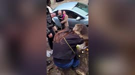 Wild monkey tries to bite head of woman attempting to feed it in China