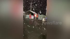 Refugees brave snowfall as they take shelter on Ukraine-Romania border