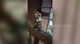 Hero police officer saves girl stuck high above ground in metro station in Delhi