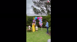 ''To infinity and beyond!' Parents-to-be do a fun-filled ball-and-racket gender reveal for 2nd child '