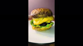 This chef uses baked potato to form bun of tasty-looking cheeseburger