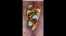Chef Turns a Naan Bread into a delicious looking Chicken Tikka Pizza