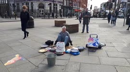 Street Drummer or Performer in Camden Town, London, England