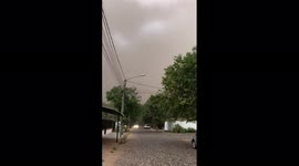 Cloud of forest fire smoke and ash covers Ayolas in southern Paraguay