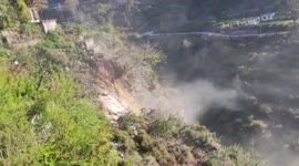 Local captures moment landslide drags several buildings down cliff in northern India