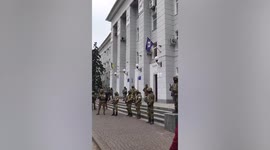 Residents protest as Russian troops take over buildings in Berdyans'k, Ukraine