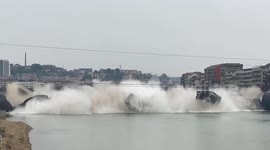 Spectacular footage shows 280-metre bridge being demolished in southern China