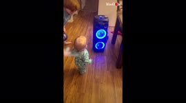'Adorable baby breaks into dance once his jam hits '