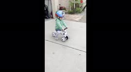 ''I Otay!' Cycling-loving toddler falls off balance bike outside her house'