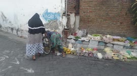 Woman Fighting for Life by Selling in Early Morning