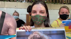 Ukraine protesters plead for international help during rally  outside Russian Embassy in Bangkok, Thailand