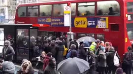 Long queues at bus stops in London as 24-hour tube strike paralyses London