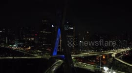 Bridge at Marginal Pinheiros, São Paulo, Brazil is illuminated with the colours of the Ukrainian flag