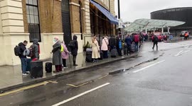 Long queue at a taxi rank in King’s Cross as a tube strike hits London