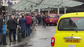 Long queue at a taxi rank in King’s Cross as tube strike hits London