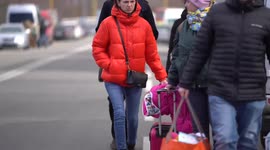 Refugees fleeing war-torn Ukraine ahead of Russian push on Kyiv find safety on border with Slovakia