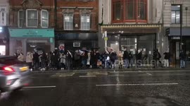 Commuters stranded in rain waiting for buses and cabs as London tube strike makes navigating UK capital chaotic