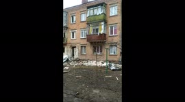 Emotional Kharkiv woman shows the vast destruction in her neighborhood from Russian invasion