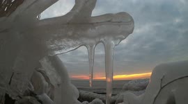 Watch this stunning sunrise captured through the ice of Lake Ontario
