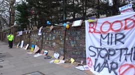 STOP the War placards on the Russian Embassy wall call for peace in Ukraine - London