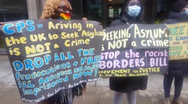 No human is a illegal immigrants demo at justice dept London