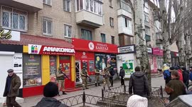 Ukrainian residents confront Russian soldiers on the street